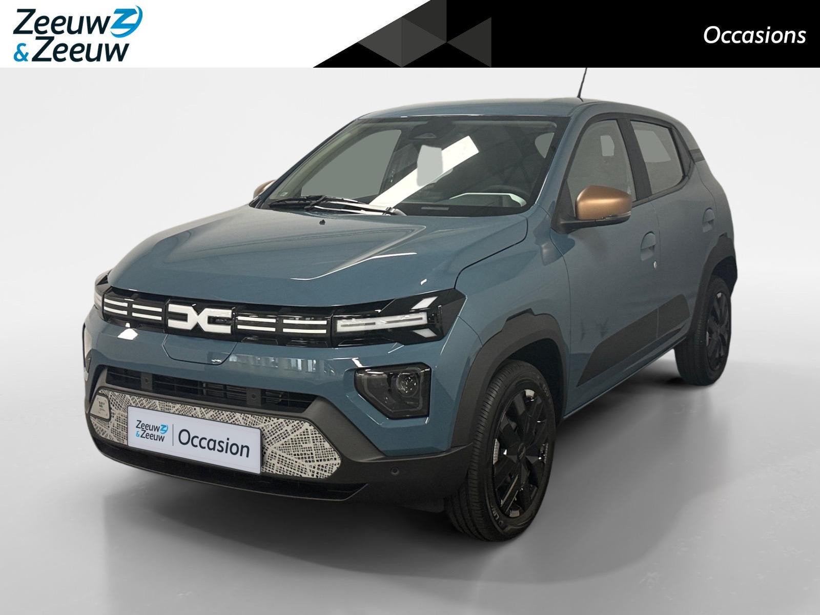 Dacia Spring Extreme 65 26.8 kWh AIRCO NAVIGATIE APPLE CARPL, Auto's, 12 maanden, Leder en Stof, Origineel Nederlands, Grijs
