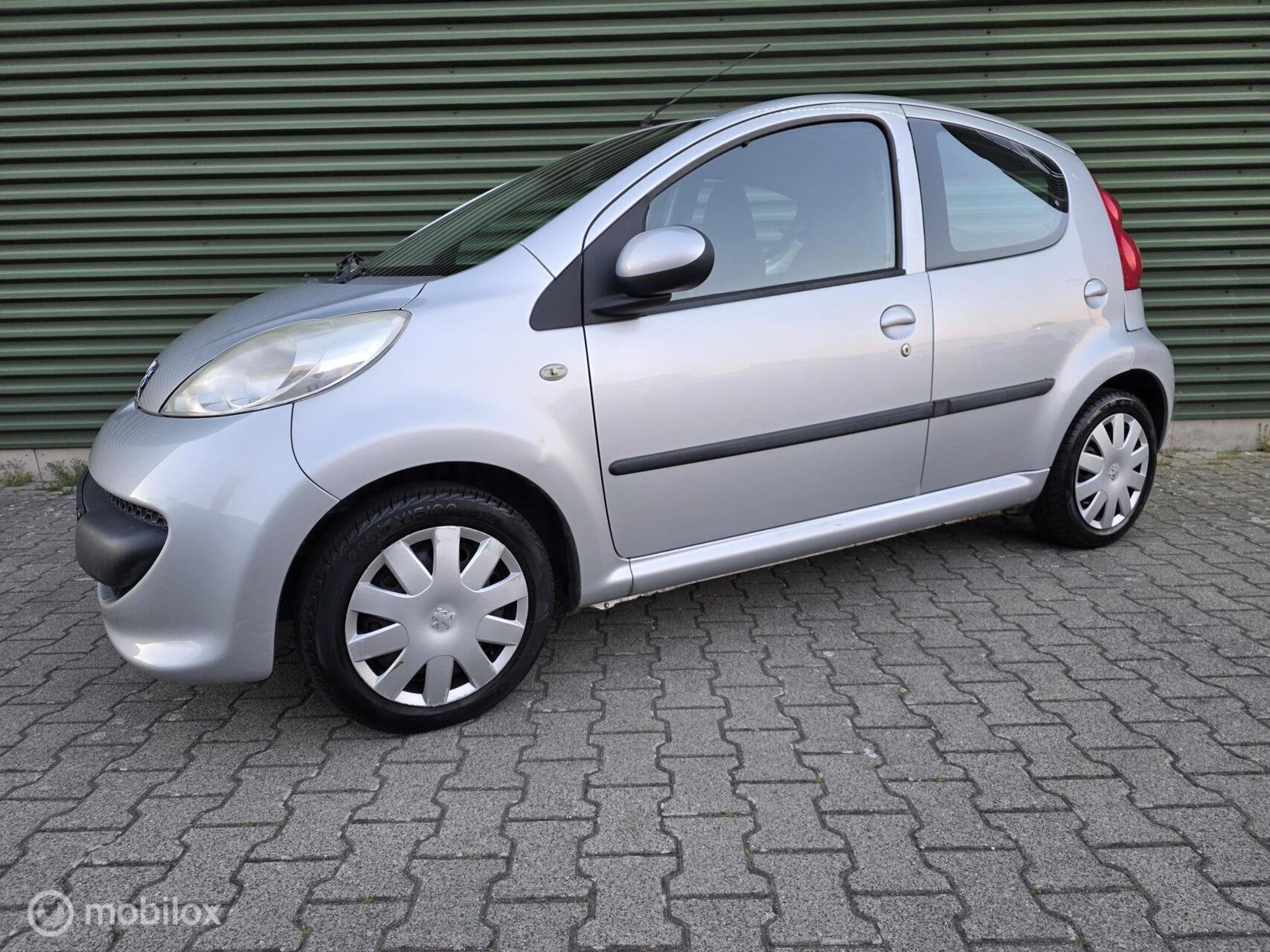 Peugeot 107 1.0-12V XS|Airco|Toerenteller|5Deurs|Elc-Pakket, Voorwielaandrijving, Stof, Gebruikt, Zwart