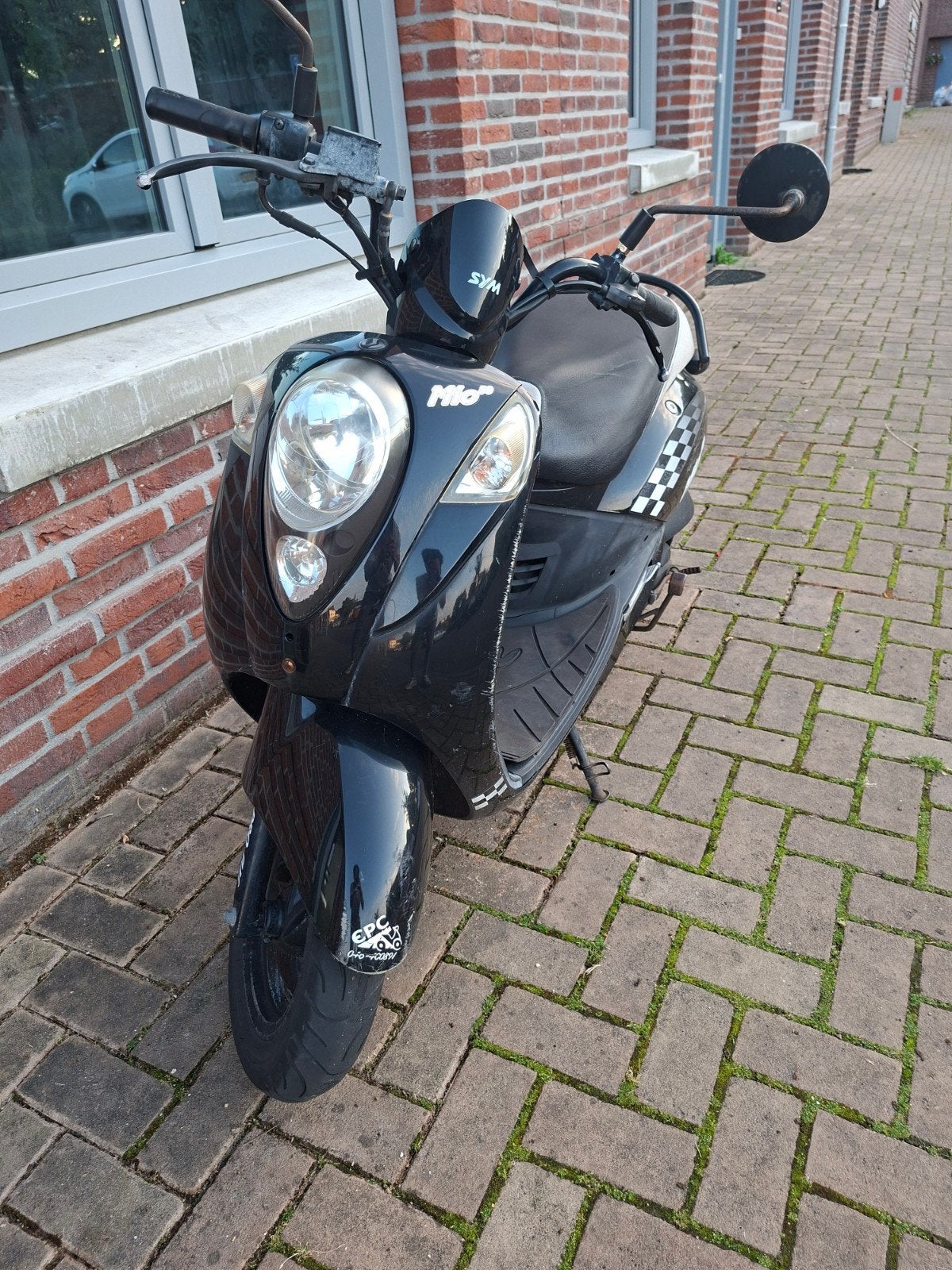 SYM Mio Scooter Zwart - Goed Onderhouden, Fietsen en Brommers, Scooters | SYM, Gebruikt, Maximaal 45 km/u, Benzine, Ophalen