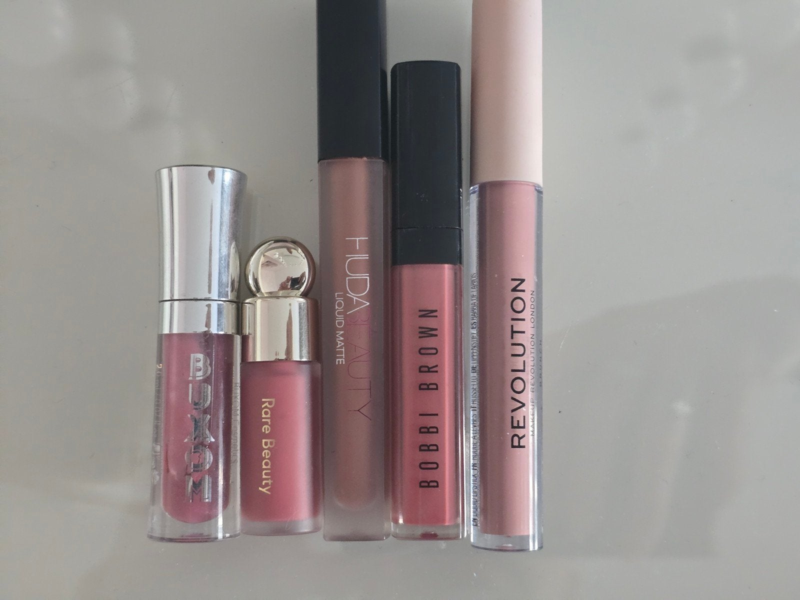 Diverse merken lippen glos / stift- Buxom, Rare Beauty, Huda, Sieraden, Tassen en Uiterlijk, Gebruikt, Ophalen of Verzenden, Make-up