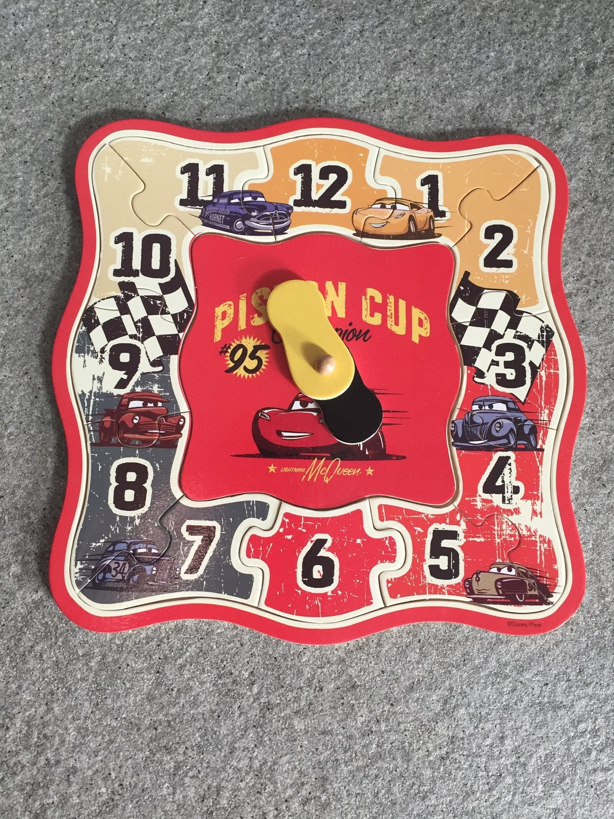 Houten puzzel klok van Cars., Ophalen of Verzenden, 10 tot 50 stukjes, Zo goed als nieuw, Van hout