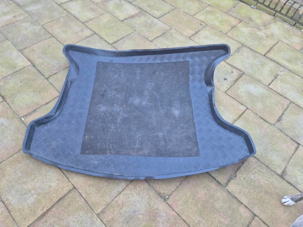 Nissan qashqai+2 kofferbakmat, Ophalen