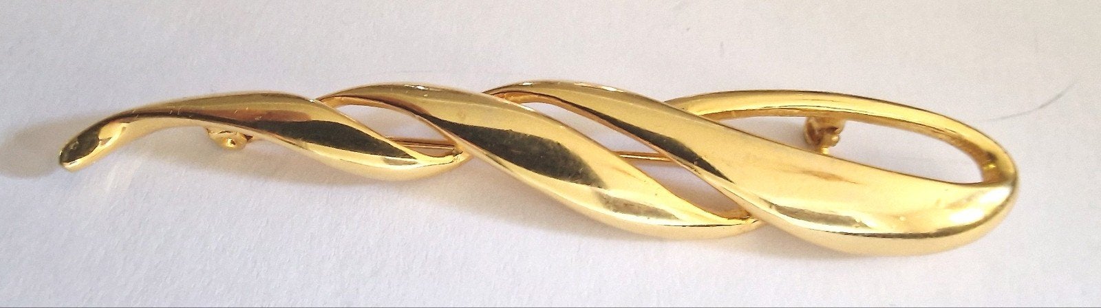 goudkleurige broche, Ophalen of Verzenden, Zo goed als nieuw, Goud, Overige materialen