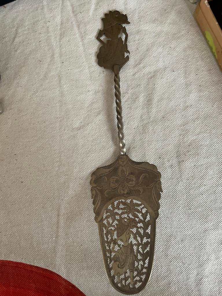 Djokja zilveren taartschep met Wayang figuur, Ophalen of Verzenden