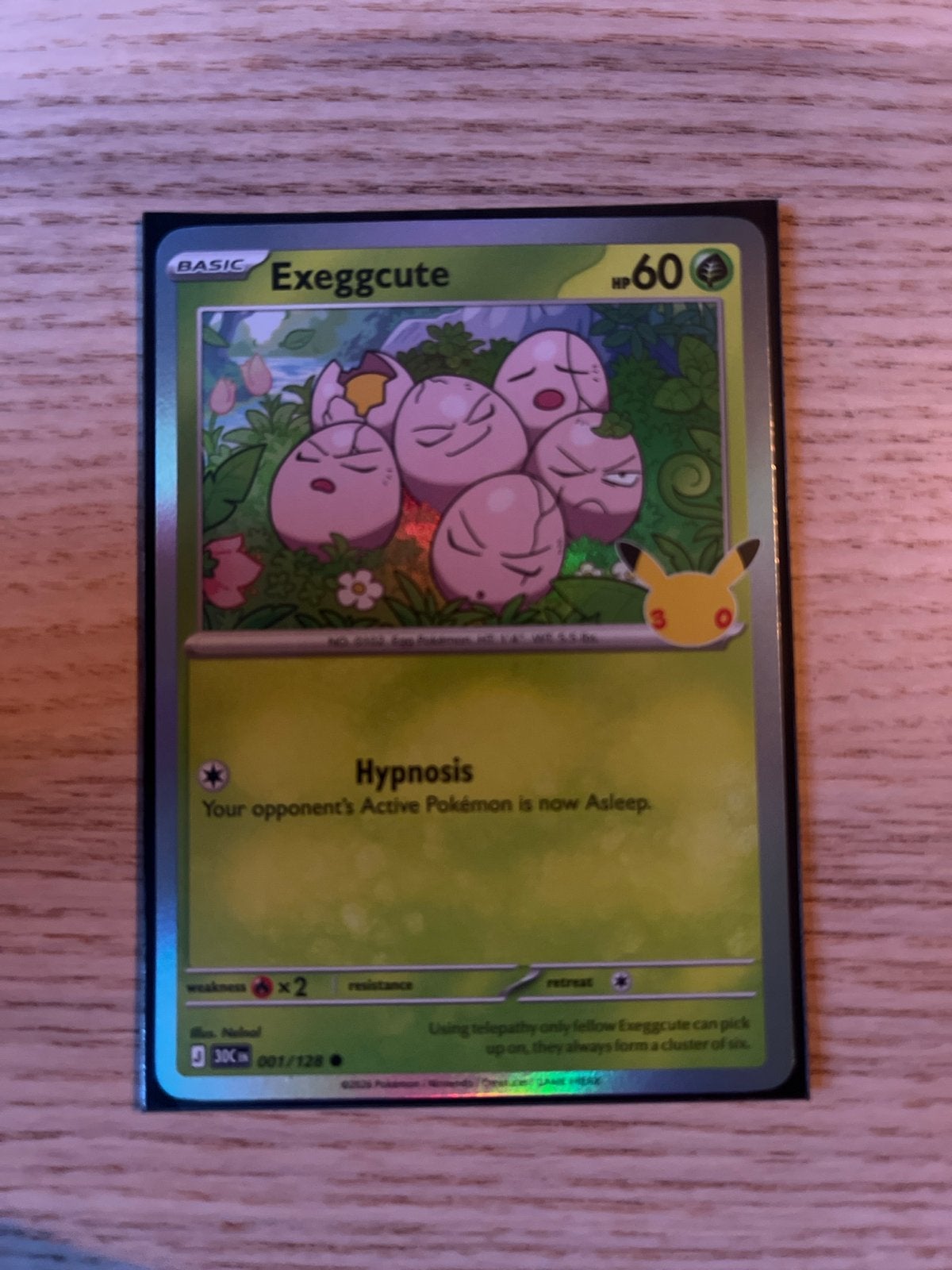 Exeggcute 30th 001/128  pokemon kaart - Mint Conditie, Ophalen of Verzenden, Zo goed als nieuw, Losse kaart