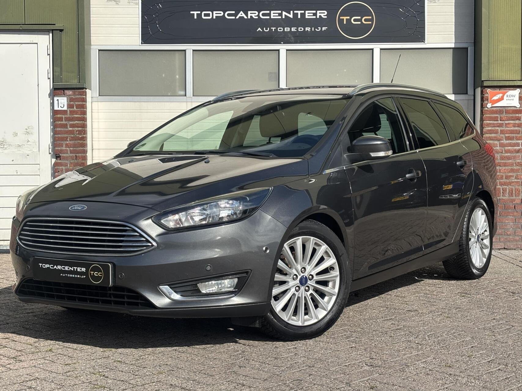 Ford Focus Wagon1.0 Titanium/AIRCO/NAVI/PARKS/CRUISE/APK/NAP, 125 pk, Euro 6, Origineel Nederlands, Handgeschakeld