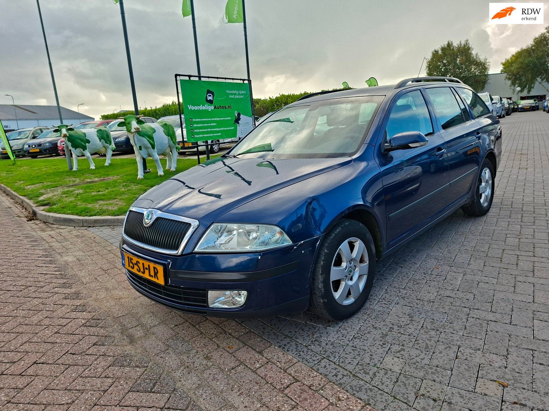 Skoda Octavia Combi 1.6 Elegance / Goede auto / APK maart 20, Auto's, Voorwielaandrijving, Gebruikt, 4 cilinders, Verwarmde buitenspiegels