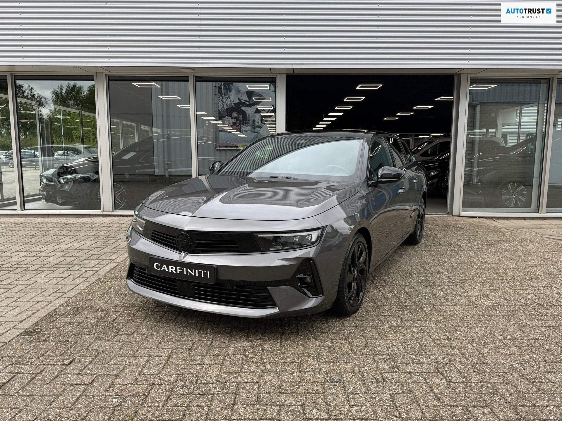 Opel ASTRA SPORTS TOURER 1.6 Turbo Hybrid GS | navi-Carplay, Auto's, Dealer onderhouden, Gebruikt, 4 cilinders, Leder en Stof
