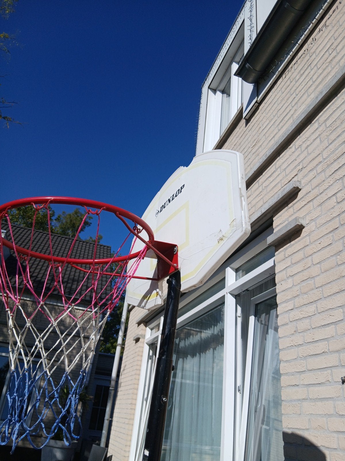 Dunlop basketbalring met standaard, Sport en Fitness, Ophalen of Verzenden, Gebruikt, Ring, Bord of Paal