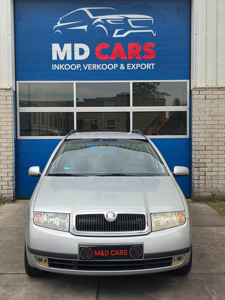Skoda Fabia Combi 1.4-16V Comfort AIRCO/NAP/CR CONTROL/ELEK, Auto's, Voorwielaandrijving, Gebruikt, Zwart, 4 cilinders