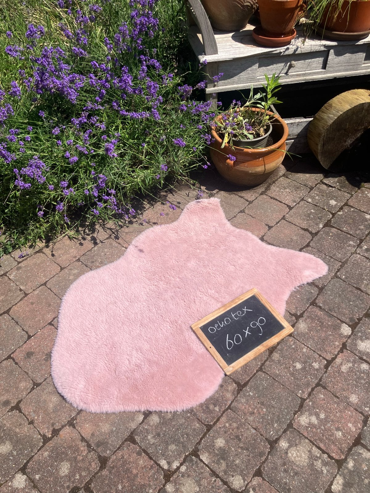 Roze schapenvacht tapijt 60x90 cm, Ophalen of Verzenden, Zo goed als nieuw, Overige vormen, 50 tot 100 cm