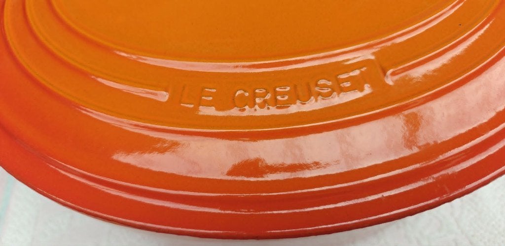 kookpot Le Creuset ovale vorm oranje kleur, Huis en Inrichting, Keuken | Potten en Pannen, Gietijzer, Pot, Bus of Blik, Ophalen of Verzenden