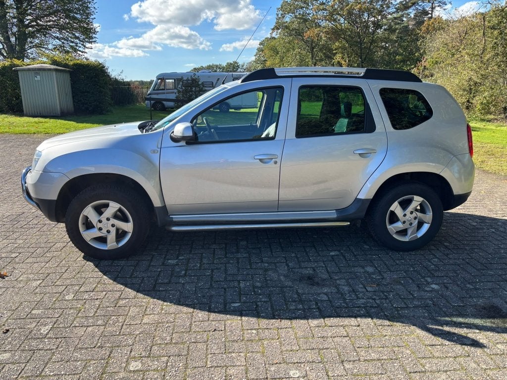 Dacia Duster 1.6 16V 74KW LPG 2012 Grijs, 4 cilinders, Duster, Leder en Stof, 49 €/maand