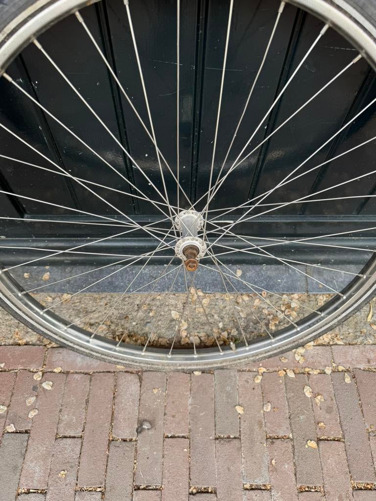 Voorwiel oma fiets 28 11/2 schothorst velg, Fietsen en Brommers, Gebruikt, Staal, Stadsfiets, Ophalen