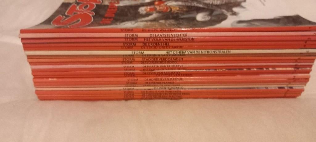 Te koop: Storm Strips 22 delen 8x 1e druk, Boeken, Ophalen of Verzenden, Zo goed als nieuw, Don Lawrence, Meerdere stripboeken