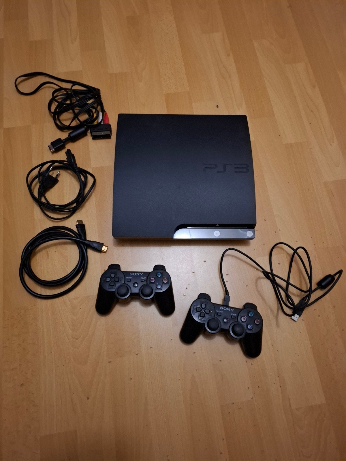 PS3 CECH-2004B met 2 controllers en 19 games, 2 spelers, Ophalen of Verzenden, Gebruikt, Vanaf 3 jaar
