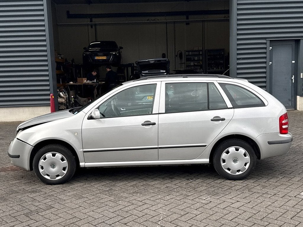 Skoda Fabia Combi 1.4-16V Comfort automaat, Auto's, 450 kg, Gebruikt, 4 cilinders, Startonderbreker
