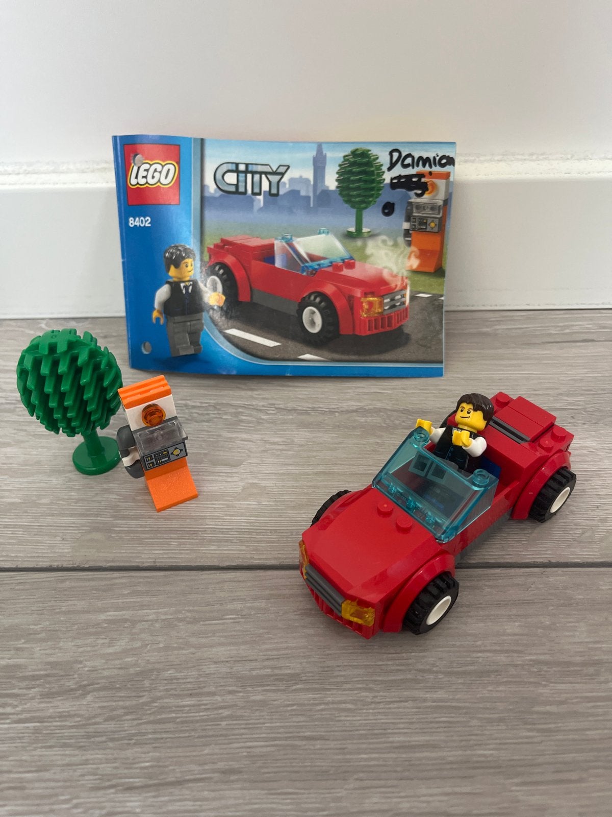 Lego City Sportwagen 8402 met minifiguur en instructies, Lego, Ophalen of Verzenden, Compleet, Complete set