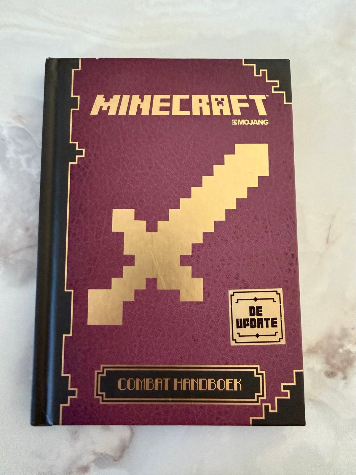 Minecraft Combat Handboek - De Update, Ophalen of Verzenden, Gelezen, Non-fictie
