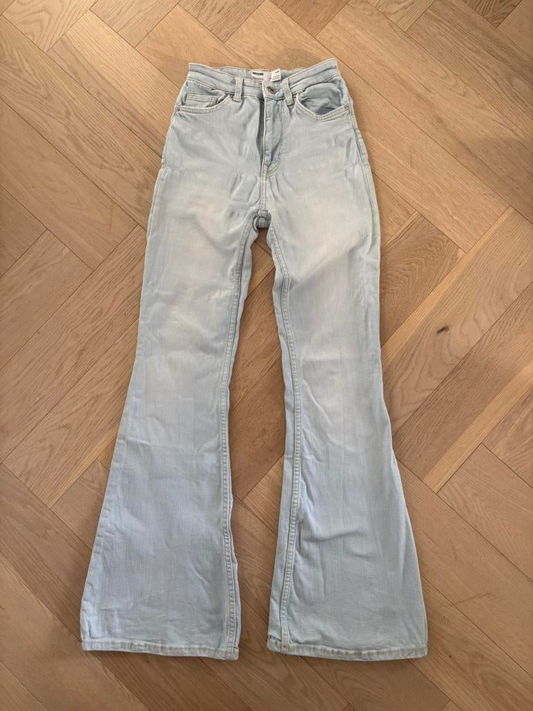 Bershka flare jeans spijkerbroek mt 32 xxs, Ophalen of Verzenden, Gedragen, Blauw, Overige jeansmaten