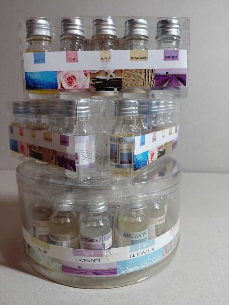 Oliebrander geurset - 12 + 3 x 5 Oliën, Huis en Inrichting, Woonaccessoires | Kandelaars en Kaarsen, Nieuw, Minder dan 25 cm, Overige materialen