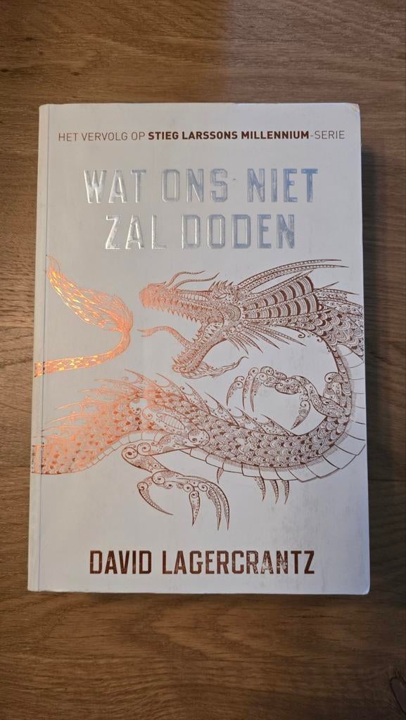 David Lagercrantz - Wat ons niet zal doden, Boeken, Thrillers, Zo goed als nieuw, Ophalen of Verzenden