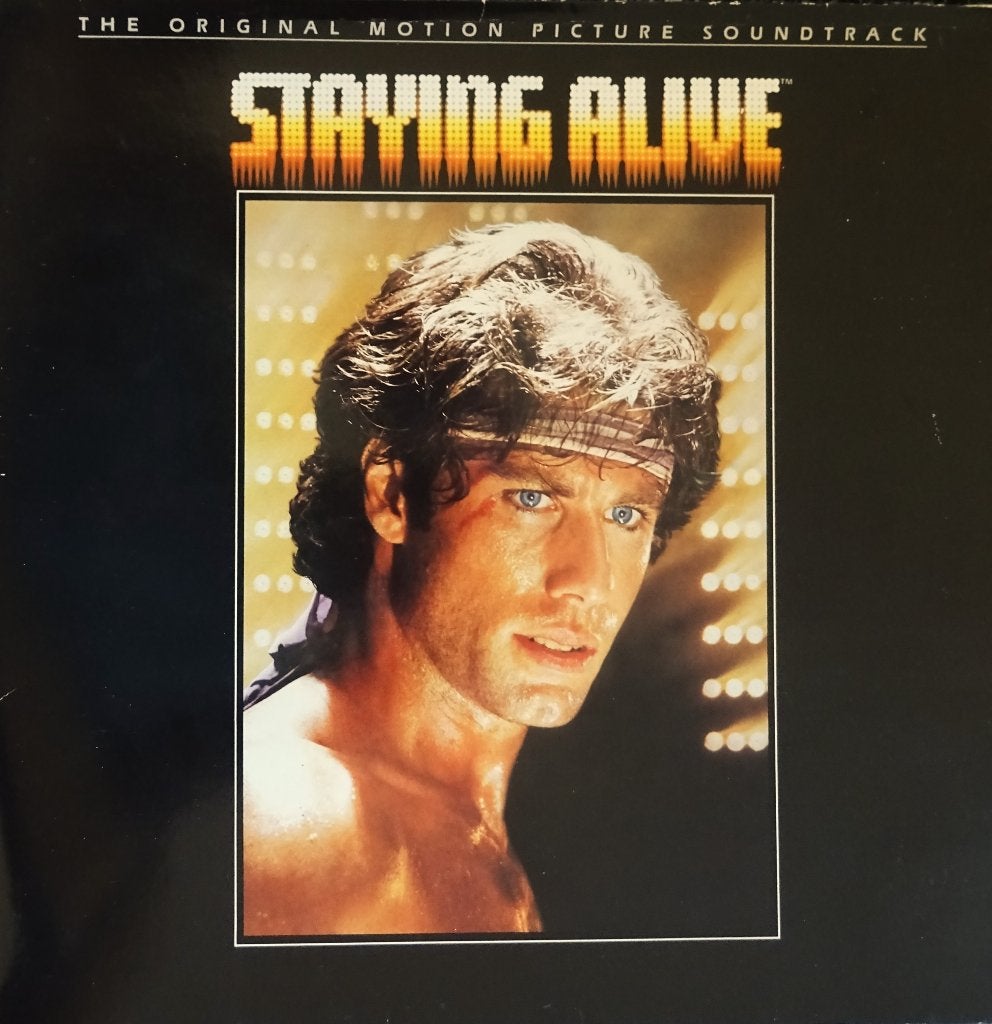 vinyl LP  STAYING ALIVE met JOHN TRAVOLTA en BEE GEES, Cd's en Dvd's, Vinyl | Pop, Ophalen of Verzenden, Inclusief binnenhoes