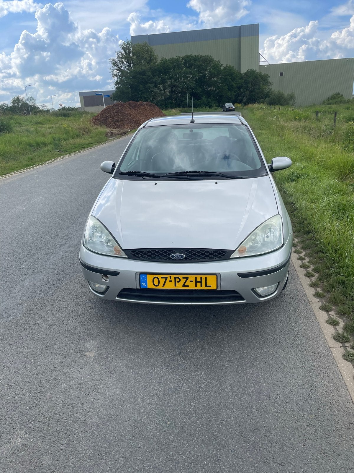 Ford Focus 1.6 I Ghia 2005 Grijs, Auto's, 1596 cc, 15 km/l, 4 cilinders, 100 pk