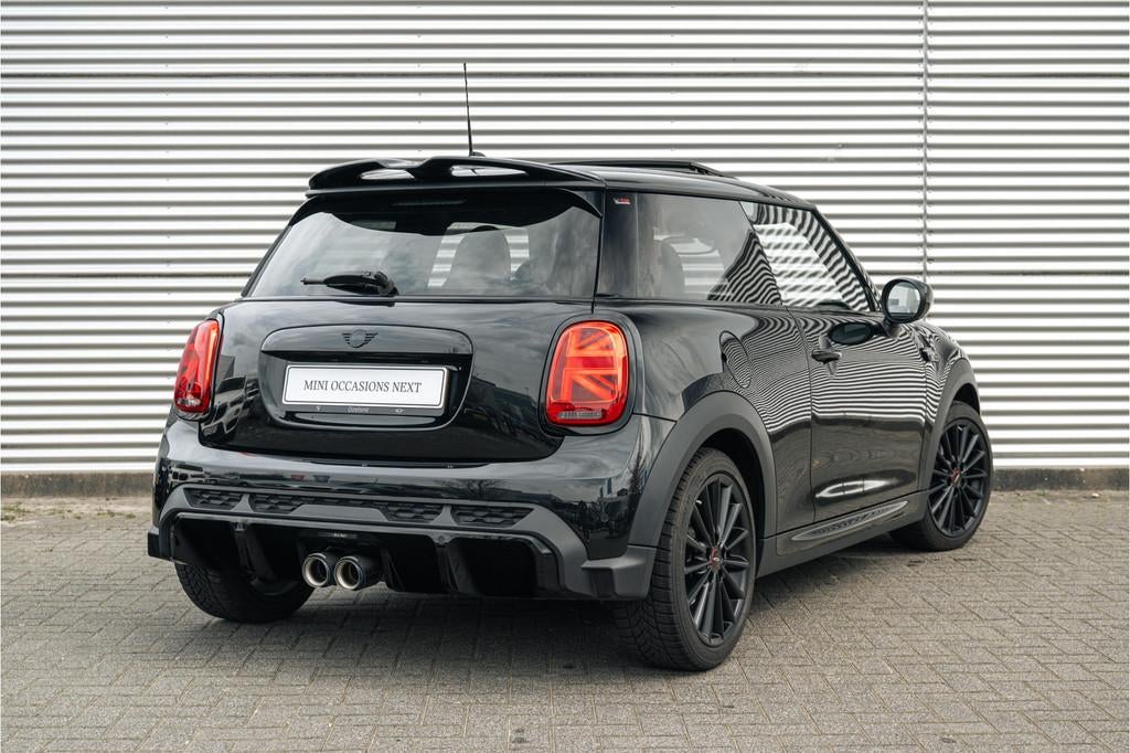 MINI Hatchback Cooper Rockingham GT JCW Automaat / Panoramad, Auto's, Gebruikt, Met garantie (alle), 4 stoelen, Leder en Stof