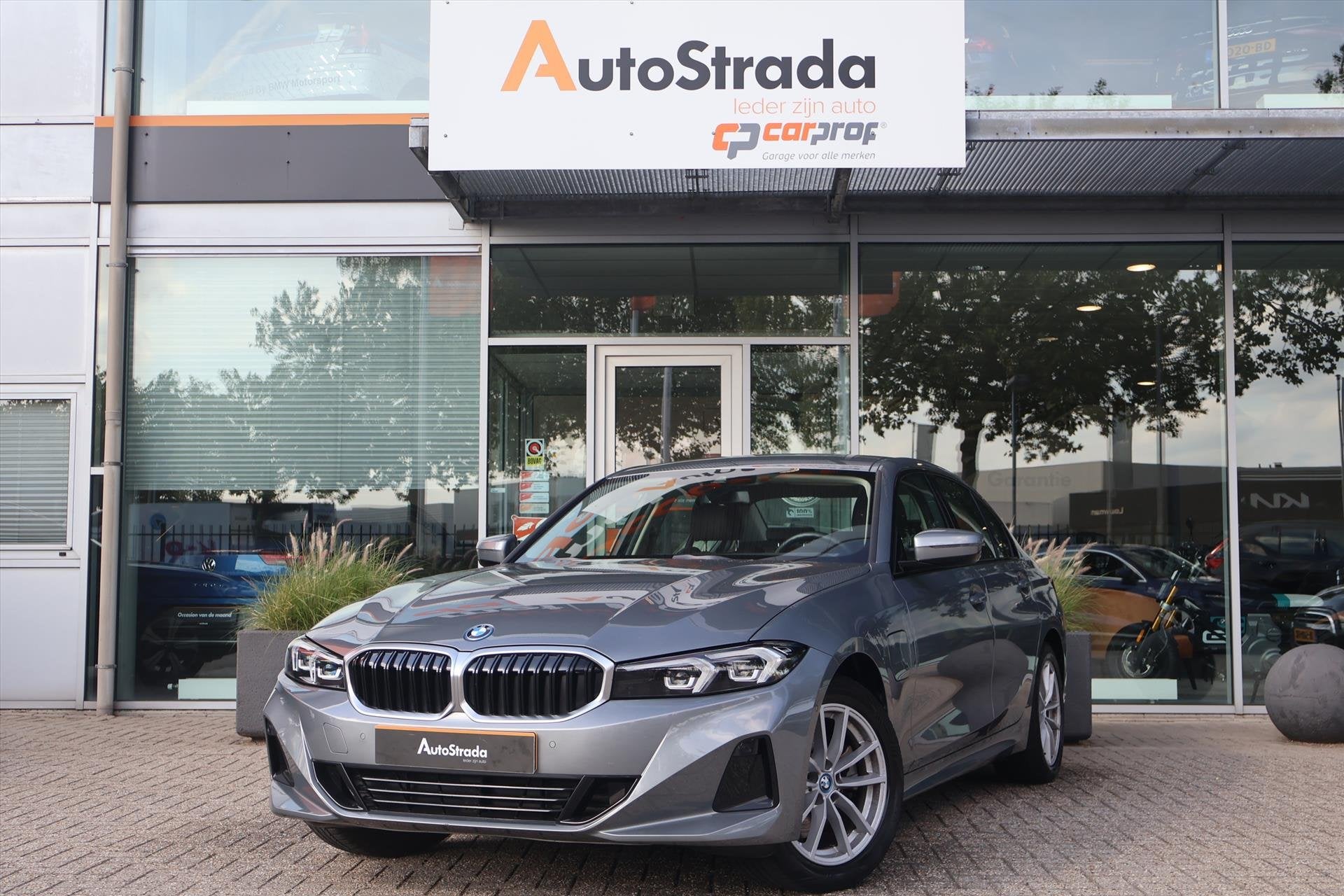BMW 3-Serie (g20) 320e High Executive 204pk | Curved Display, Auto's, 1998 cc, 77 km/l, Gebruikt, 4 cilinders