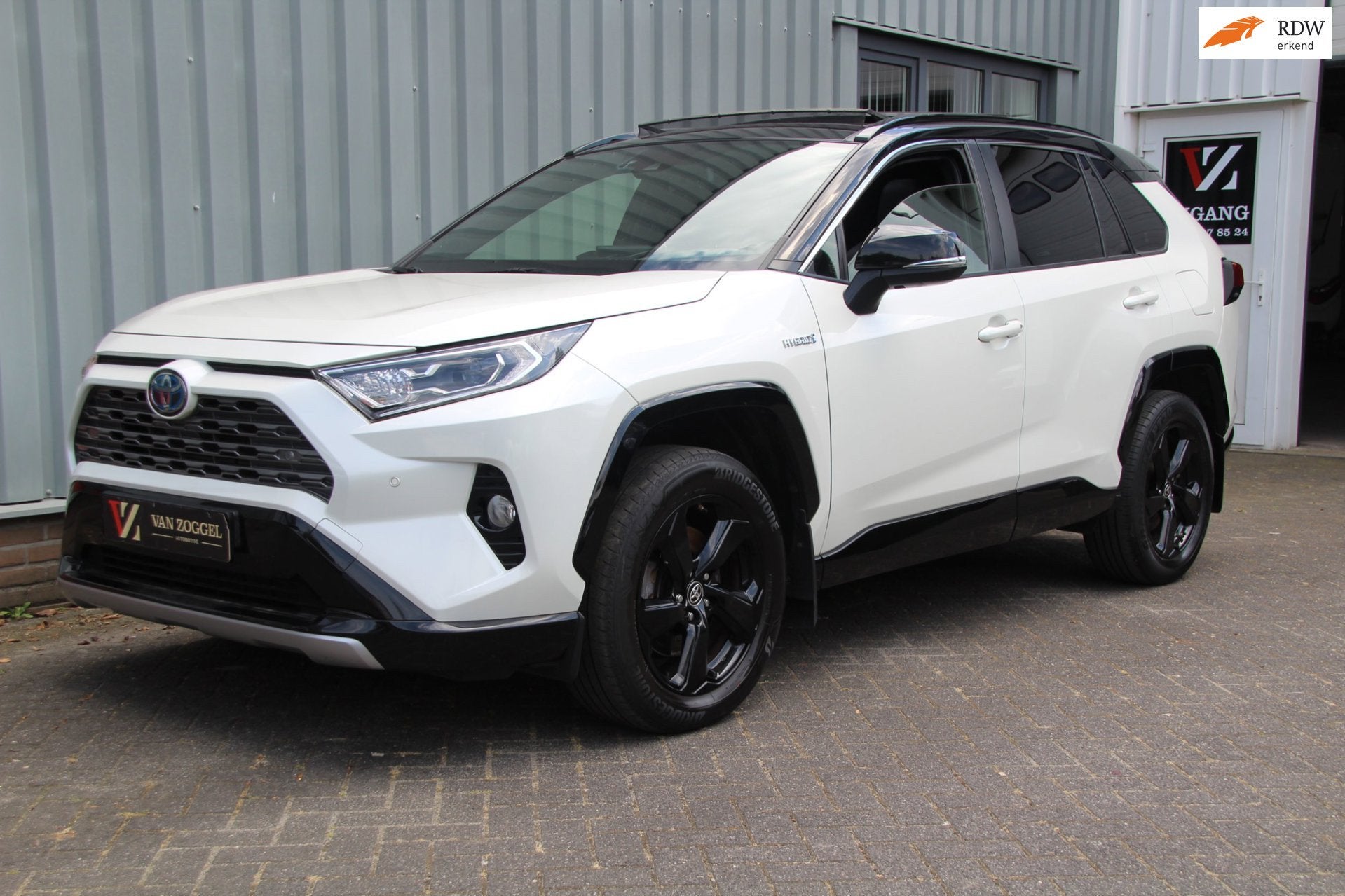 Toyota RAV4 2.5 Hybrid Bi-Tone Verwacht, Auto's, Gebruikt, Zwart, Leder en Stof, Wit