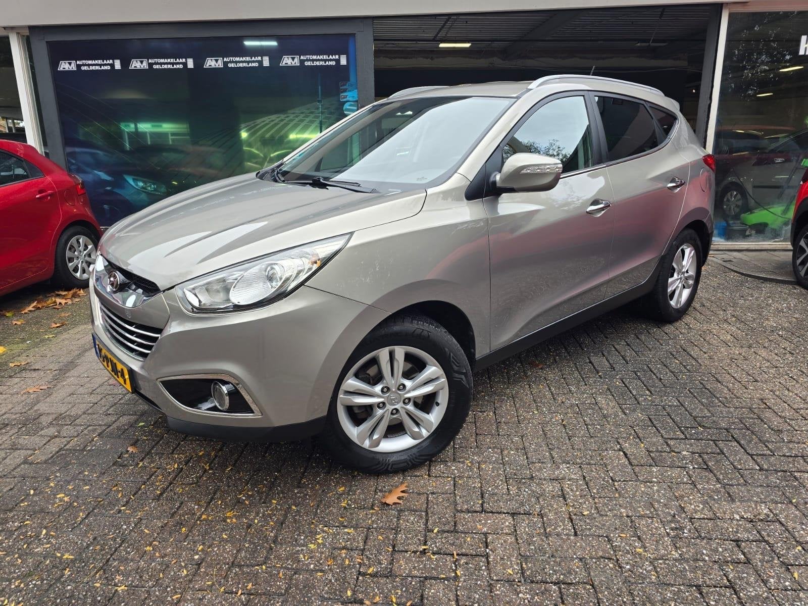 Hyundai ix35 2.0i 4WD Style | 1E EIGENAAR | NAVI | TREKHAAK, 13 km/l, Gebruikt, 4 cilinders, Leder en Stof