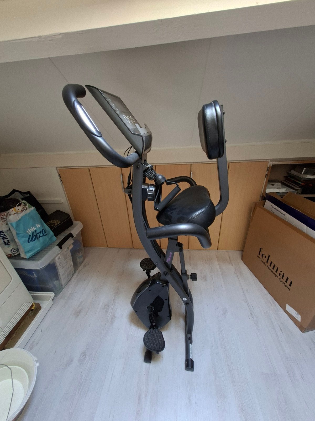 Slim Cycle Hometrainer, Ophalen