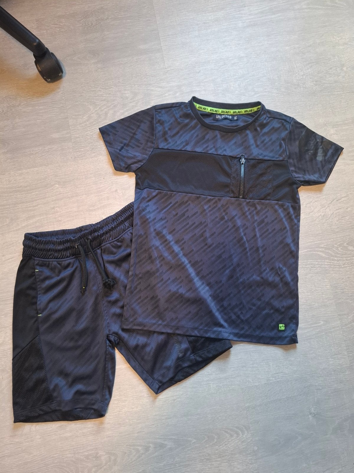 Unlocked gym setje maat 134/140 jongen, Gebruikt, Sport- of Zwemkleding, Ophalen of Verzenden, Unlocked