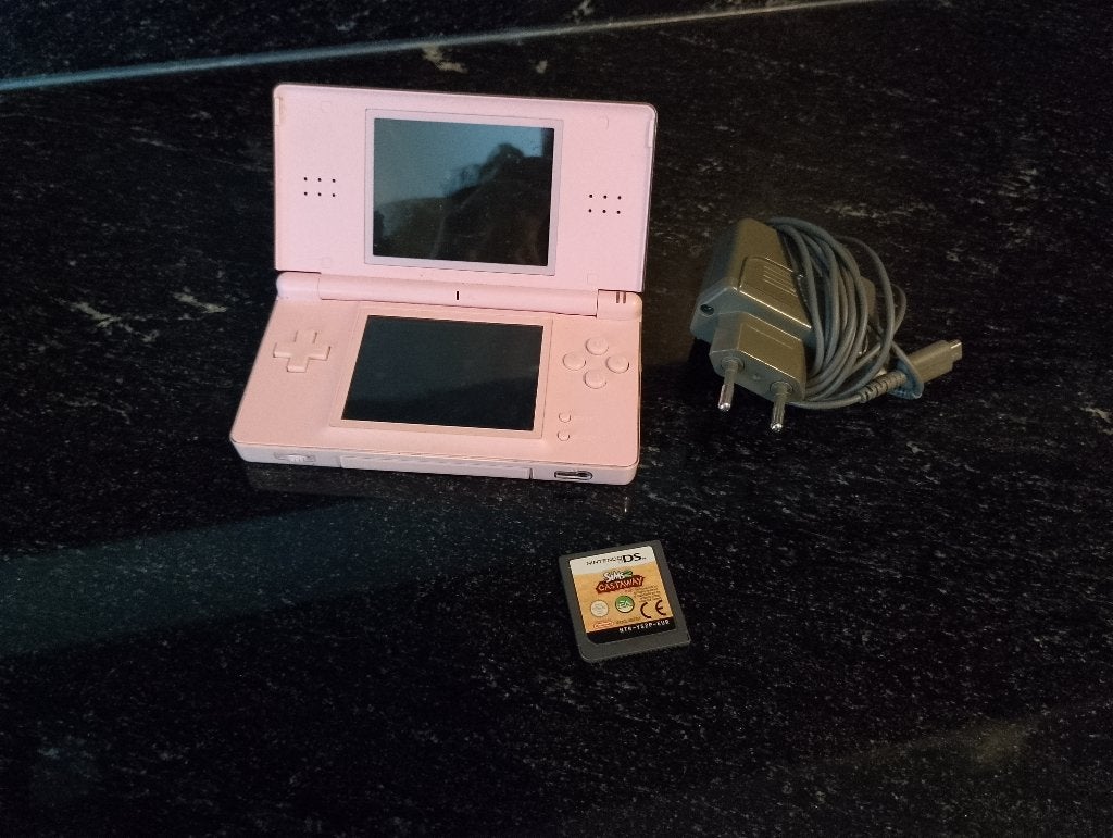 Nintendo DS Lite roze – Met oplader en spel (The Sims), Spelcomputers en Games, Ophalen of Verzenden, Roze, DS Lite, Gebruikt