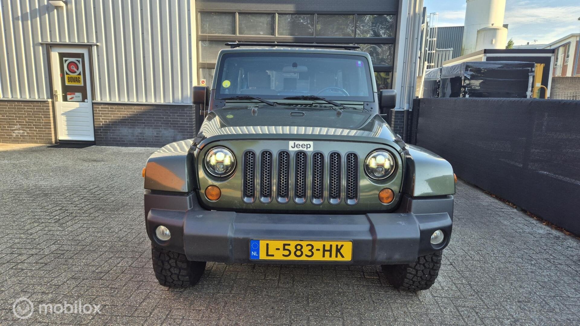 Jeep Wrangler Unlimited 3.8 Sahara, Auto's, Jeep, Stof, Gebruikt, 120 €/maand, Bedrijf