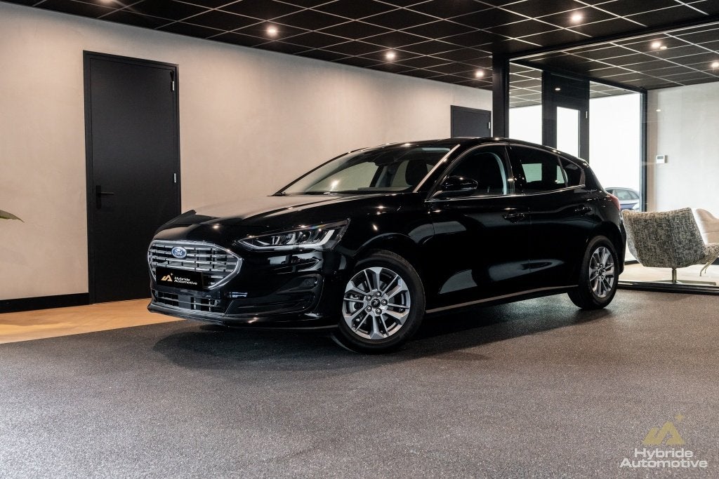Ford Focus 1.0 EBH Titanium (bj 2025), Auto's, 12 maanden, Euro 6, Zwart, Origineel Nederlands