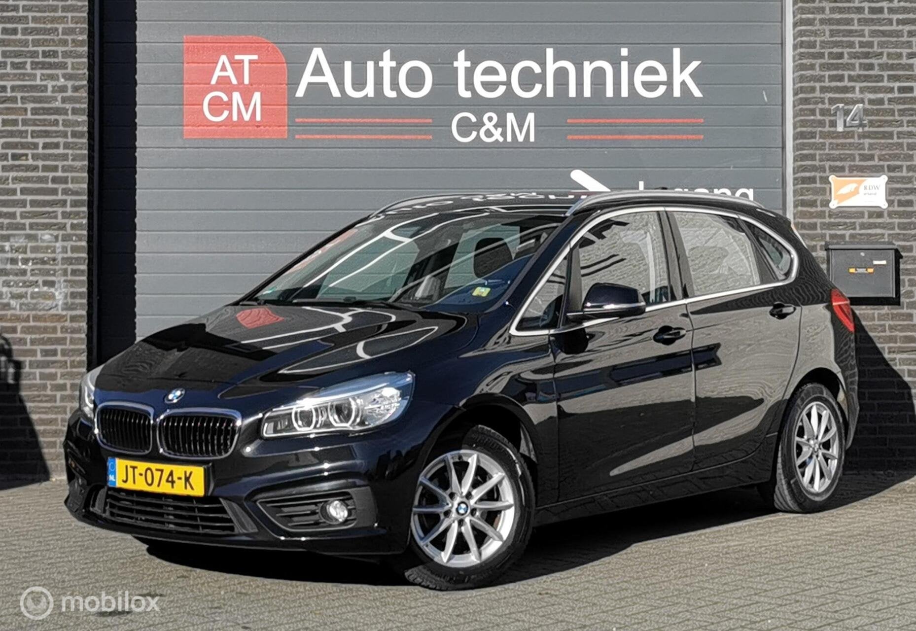 BMW 2-SERIE ACTIVE TOURER 216i 102PK/NAP/NAVI/LED/PDC/CRUISE, Auto's, Voorwielaandrijving, Stof, Zwart, Bedrijf