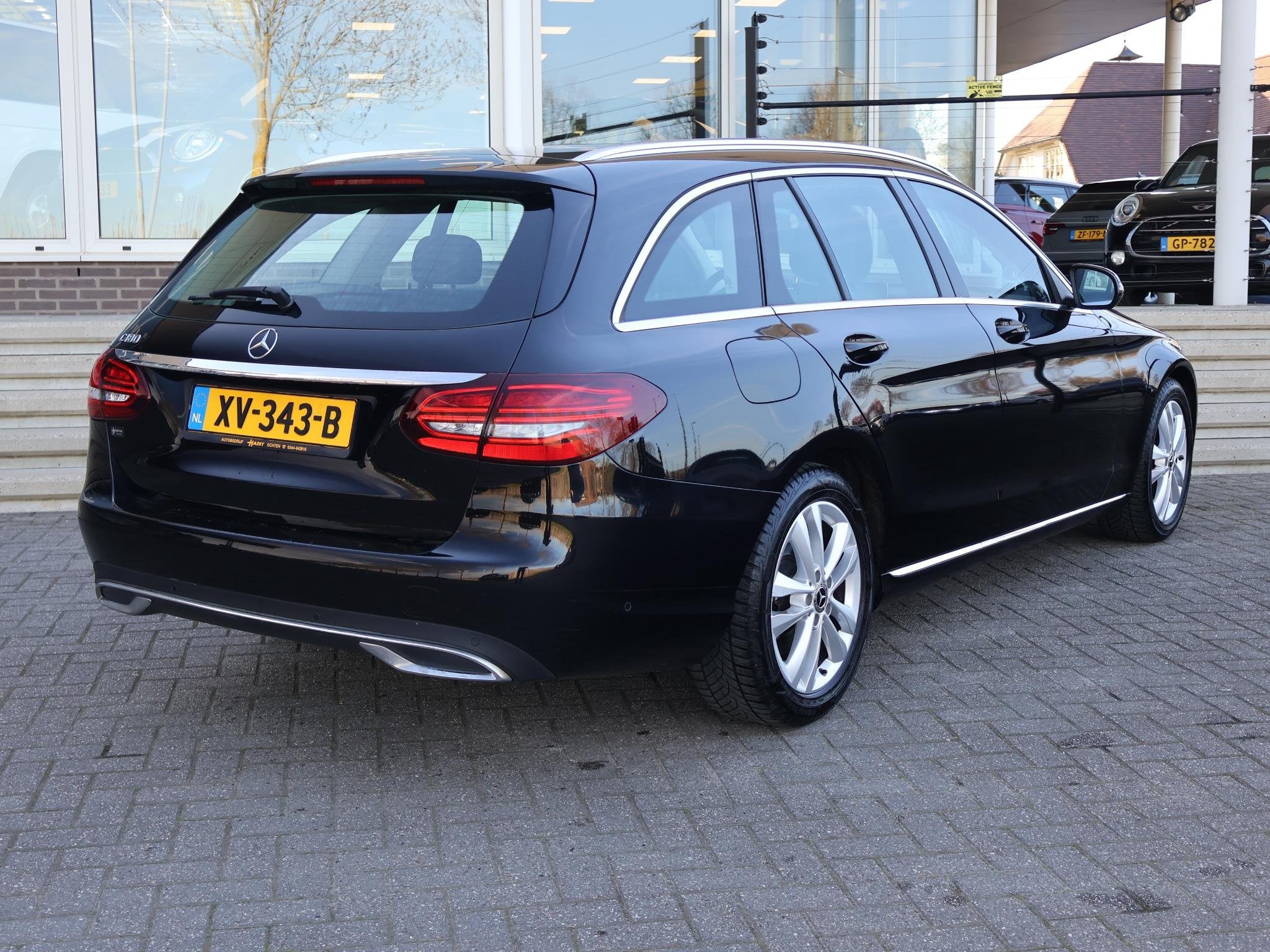 Mercedes-Benz C-klasse Estate 180 AUT. PREMIUM PLUS + BREEDB, Auto's, Mercedes-Benz, Automaat, Zwart, 1595 cc, 750 kg