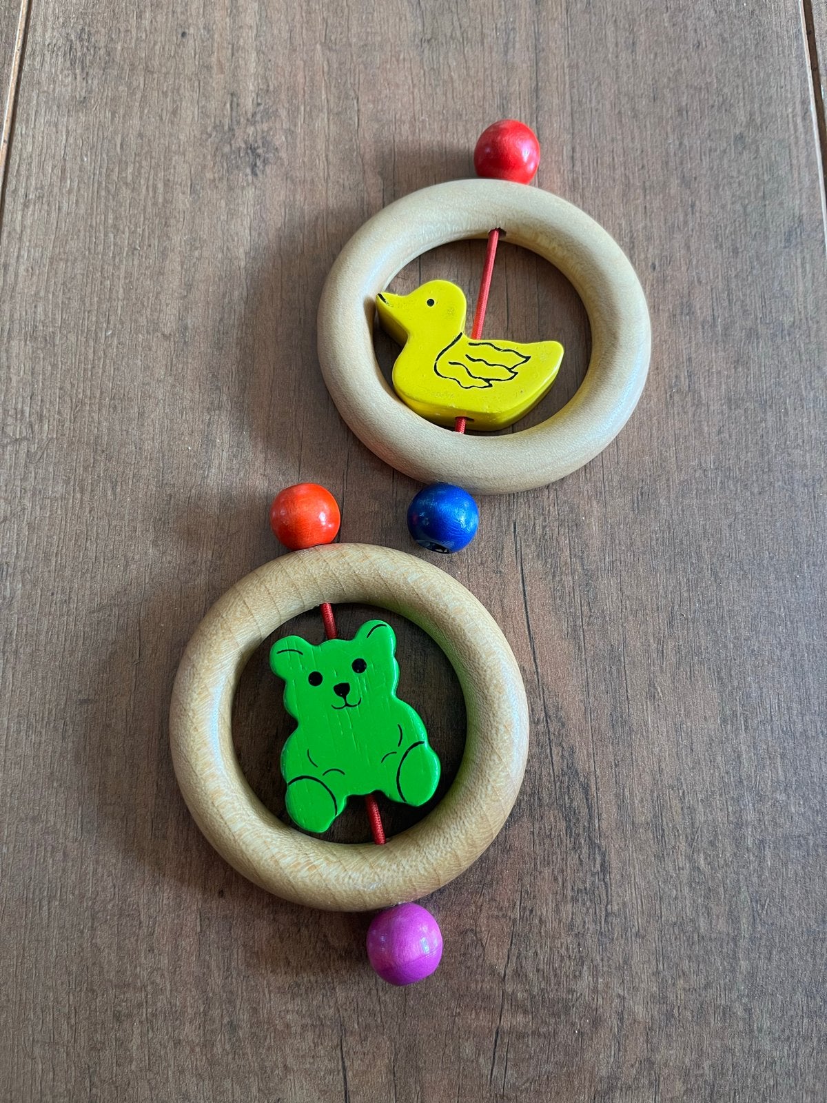 Houten rammelaar retro - eend en beer, Ophalen, Gebruikt, Rammelaar, Met geluid