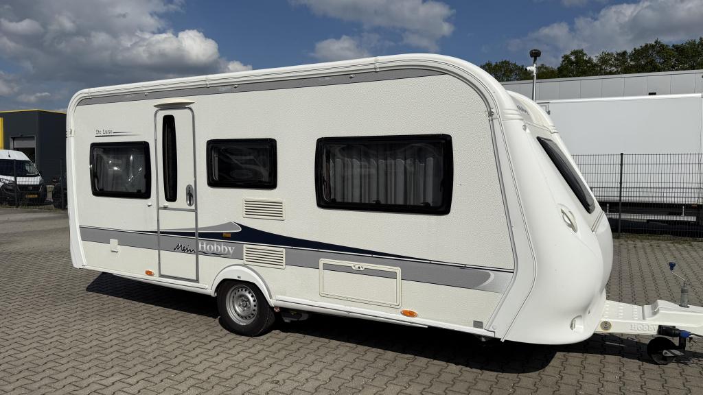 Hobby De Luxe 495 UL bouwjaar 2011 met luifel, Caravans en Kamperen, Caravans, Rondzit, Hobby, Bedrijf, Schokbreker