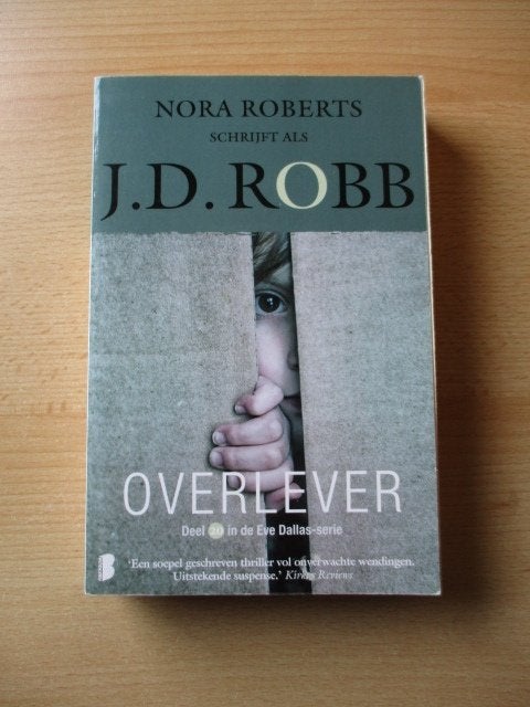 J.D. Robb boek  deel 20  Overlever - Eve Dallas serie, Ophalen of Verzenden, Gebruikt