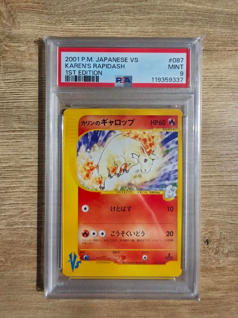 Pokémon Karen's Rapidash 1st Edition PSA 9 MINT #087, Ophalen of Verzenden, Zo goed als nieuw, Losse kaart