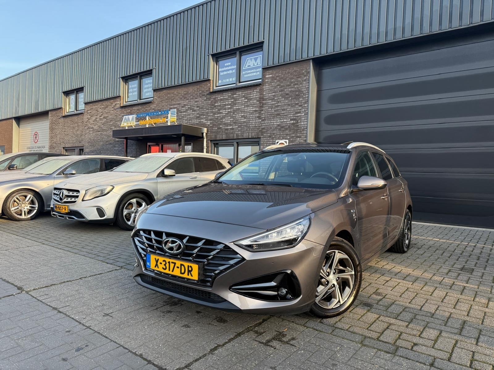 Hyundai i30 Wagon 1.5 T-GDi MHEV Premium | 1E EIGENAAR | 3/6, Auto's, Gebruikt, Euro 6, 4 cilinders, Bruin