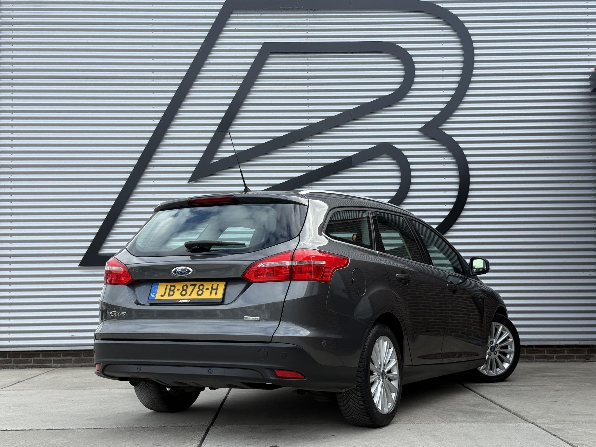 Ford Focus Wagon 1.0 Titanium 2e Eigenaar|Clima|Cruise|PDC V, Gebruikt, Euro 6, Handgeschakeld, 1216 kg