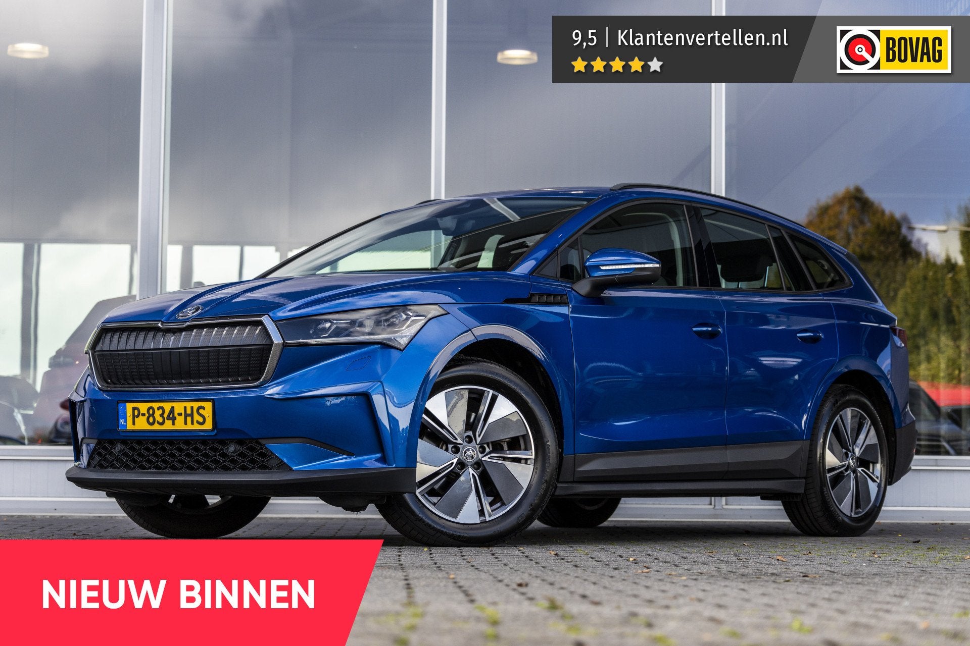 Skoda Enyaq iV 60 | SOH 92% | E-Trekhaak | Camera (bj 2022), Auto's, Achterwielaandrijving, Gebruikt, Zwart, Leder en Stof