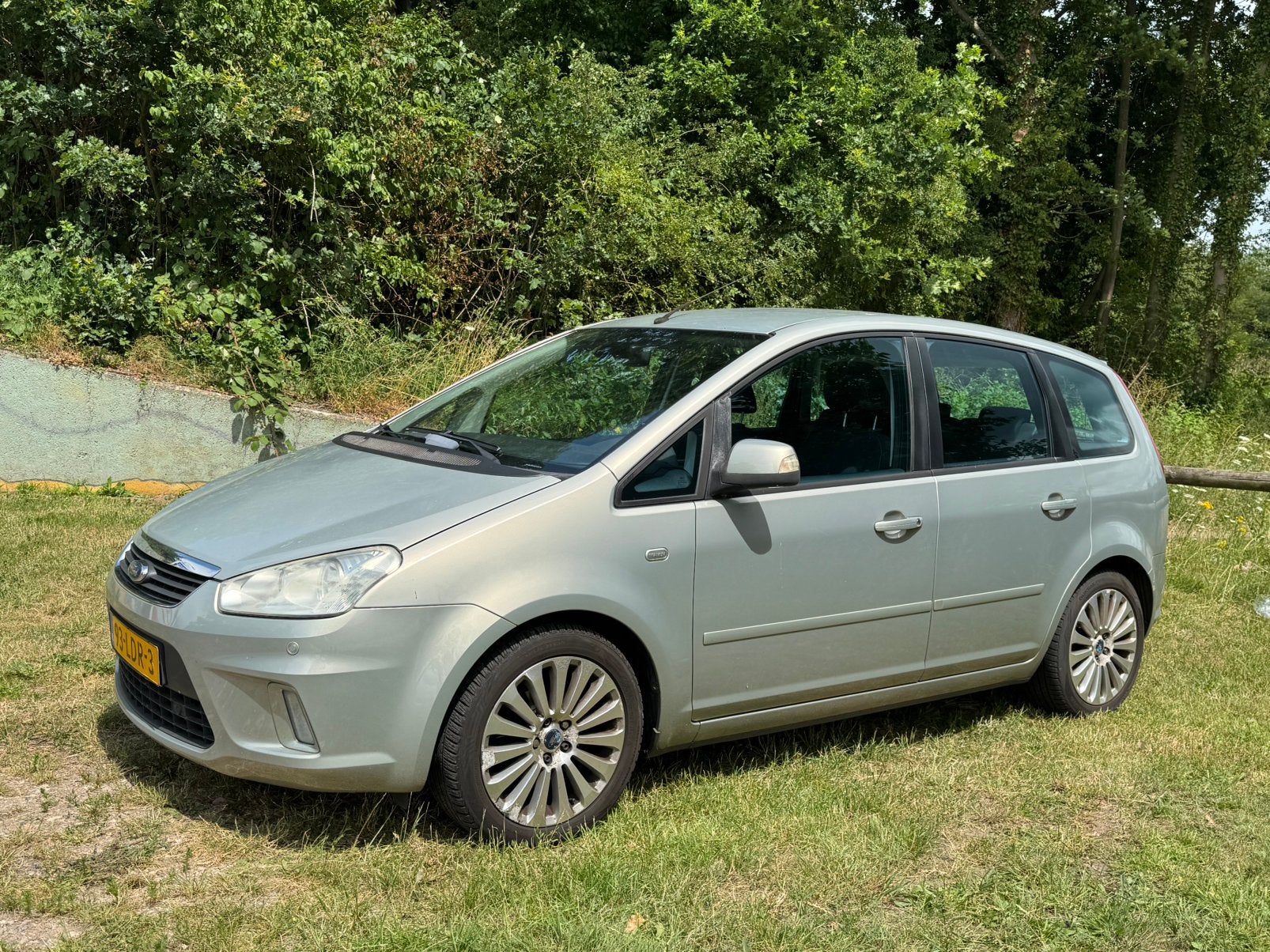 Ford C-Max 1.8 92KW Limited (Titanium) Clima/Cruise/Navi, Auto's, Voorwielaandrijving, Zwart, 4 cilinders, Bruin