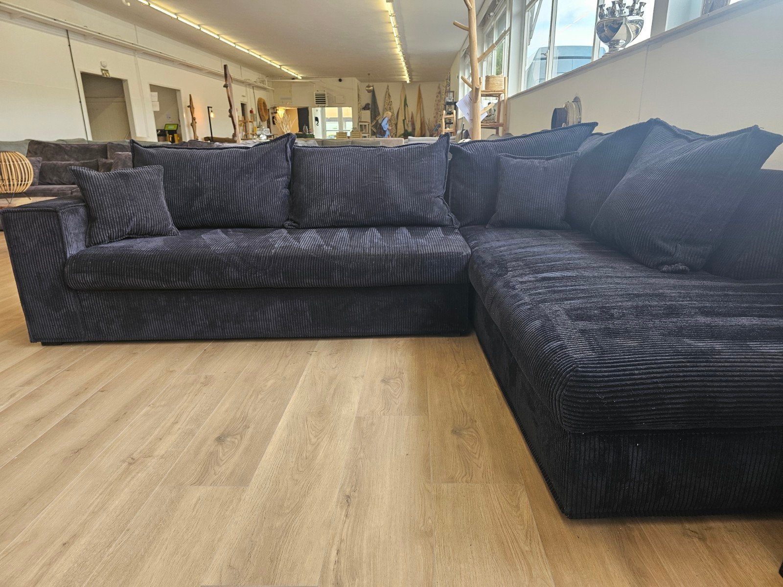Zwarte Ribstof hoekbank, 125 cm of meer, 125 cm of meer, Zo goed als nieuw, Info@homefriesland.nl