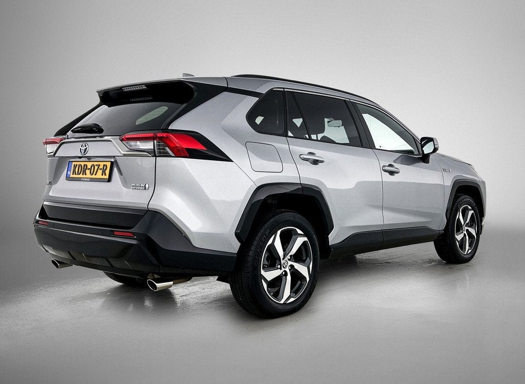 Toyota RAV4 2.5 Plug-in Hybrid AWD Dynamic (bj 2023), Auto's, 12 maanden, Stof, Gebruikt, Euro 6