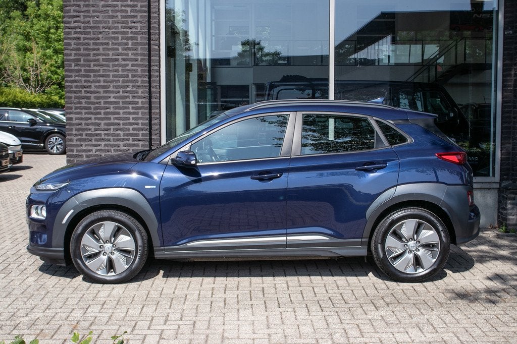 Hyundai KONA EV Comfort 64 kWh | SOH 100 % | Apple cp/Androi, Auto's, Hyundai, 12 maanden, Gebruikt, Blauw, Origineel Nederlands